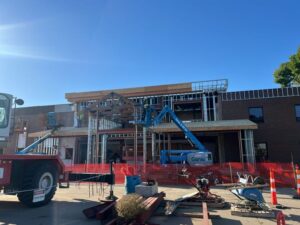 Front of building under construction.