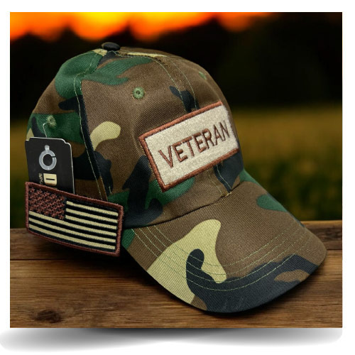 Green veteran's hat with removable patch.