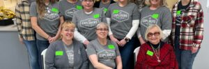 Image of many of the Explorers Cu staff members serving at the Yankton Banquet