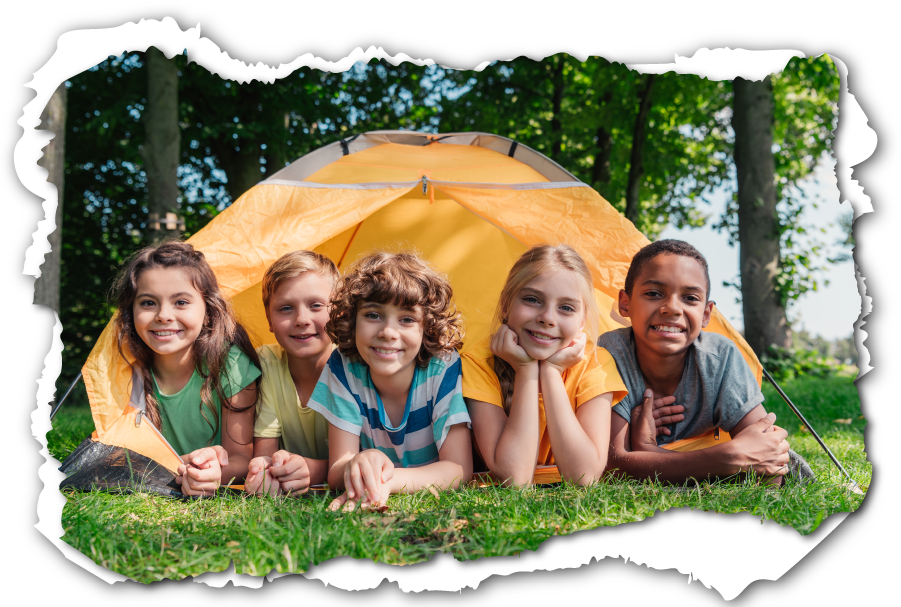 Group of young kids camping in front of yellow tent.